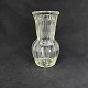 Height 16 cm.
Clear press 
glass vase from 
Holmegaard 
Glassworks.
The vase can 
be seen in ...