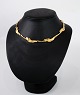 14 carat 
necklace in 
gold of 
Lapponia, which 
is a Finnish 
design. In very 
good ...
