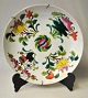 Chinesischer 
Porzellanteller, 
famille rose, 
19. Jh. 
Polychrom mit 
Blumen 
verziert. 
Gestempelt. ...