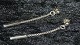 Elegant # 
Earrings with 
chain in Silver
Stamped 925s
Nice and well 
maintained 
condition