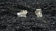 Elegant # 
Earrings with 
stones in 
Silver
Stamped 925s 
Yes
Measures 4.41 
* 7.58 mm
Nice and ...