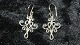 Elegant # 
Earrings in 
Silver
Stamped 925 SC
Measures 34.59 
mm
Nice and well 
maintained 
condition
