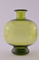Holmegaard 
glasswork, 
artist Per 
Lütken year 
1963. 
Per Lütken 
Maygreen glass 
vase, height 
21.5 ...