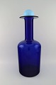 Otto Brauer for 
Holmegaard. 
Large vase / 
bottle in blue 
art glass with 
light blue 
ball. ...