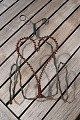 Newspaper holder in steel wire. Swedish tramp work