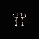 Hermann 
Siersbøl. 14k 
Gold Screw back 
Earrings with 
Pearl.
Designed and 
crafted by 
Hermann ...