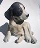 Porcelain 
figure from 
Royal 
Copenhagen. 
Imaginative 
sitting pointer 
puppy. Designed 
by Erik ...