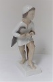 Bing & 
Gröndahl. 
Porzellanfigur. 
Der Sandman. 
Modell 2055. 
Höhe 18,5 cm. 
(1 Wahl)