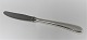 Michelsen. Ida. 
Menüemesser. 
Entwurf: Ole 
Hagen. Sterling 
(925). Länge 
23,5 cm.