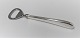 Michelsen. Ida. 
Kapselöffner. 
Entwurf: Ole 
Hagen. Sterling 
(925). Länge 
14,5 cm.