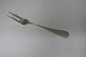 Michelsen. Ida. 
Fleischgabel. 
Entwurf: Ole 
Hagen. Sterling 
(925). Länge 21 
cm.