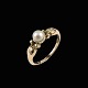 Georg Jensen. 
14k Gold Ring 
with Pearl 
#180.
Designed by 
Harald Nielsen 
1892 - 1977.
Stamped ...