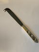 Cheese knife 
with crown
Sterling 
silver
ll we Helmuth 
Mohke
Length 21.4 cm
Polished and 
...