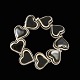 Royal 
Copenhagen / A. 
Michelsen. 
Porcelain and 
Sterling Silver 
Heart Bracelet.
Designed and 
...