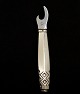 Georg Jensen 
Rune bottle 
opener 10 cm. 
track of use  
Item No. 512685