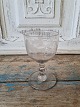 19th century 
Danish wine 
glass on a stem 
with a button, 
decorated with 
a matte cut 
vine with 3 ...