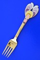 Gilded sterling 
silver with 
enamel motif. 
Christmas fork 
1972 "Heral". 
Designed by: 
Bjørn ...
