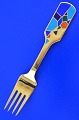 Anton Michelsen 
christmas 
cutlery, gilded 
sterling silver 
with an inlaid 
enamel motif. 
Christmas ...