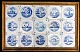 Fliesentischplatte 
mit 15 blau 
dekorierten 
Fliesen, 
Holland. 18. 
Jahrhundert 13 
x 13 cm. Szenen 
...