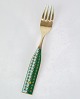 Anton Michelsen 
Christmas fork 
in gilded 
silver with a 
Winter Solstice 
motif by the 
artist Rolf ...