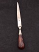 Paper knife 
length 24 cm. 
silver in 1928 
with amber-like 
handle No. 
523815