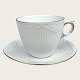 Royal 
Copenhagen, 
Tradition, 
White fluted 
with gold rim, 
Coffee cup 
#1275 / 756, 
6.5cm high, ...