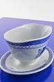 Aluminia / 
Royal 
Copenhagen 
faience, Blue 
Tranquebar. 
Sauce boat no. 
11/1107. Height 
10 cm. ...