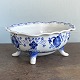 Aluminia 
faience from 
the frame 
Tranquebar. 
Oval bowl on 
feet with wavy 
edge. The 
bottom is ...