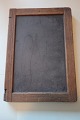Eine alte 
Schule-Tafel 
aus Schiefer 
mit Rahmen aus 
Holz
In gutem 
Zustand
Varennr.: 
2-41331