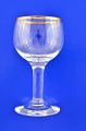 Nyhavn glas 
Holmegaard 
1950-1980. 
Nyhavn Süsswein 
Glas mit 
Goldrand, Höhe 
9,7 cm. 
Tadelloser 
Zustand