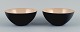 Two "krenits" bowls in metal.Beige.