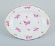Royal 
Copenhagen, 
oval serving 
dish hand 
painted with 
purple flowers 
and gold rim.
Approx. ...