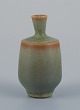 Berndt Friberg 
for 
Gustavsberg, 
Studiohand 
miniature vase 
with glaze in 
shades of ...