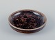 Nils Thorsson 
for Royal 
Copenhagen, 
unique ceramic 
bowl with 
abstract motif 
and glaze in 
brown ...