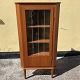 Eckschrank aus 
Teakfurnier. 
Dänische 
Moderne aus den 
1960er Jahren. 
Mit Glastür und 
in sehr ...