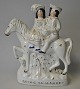 Staffordshire-
Figur, bemalte 
Fayence, „Going 
to Market“, 
England des 19. 
Jahrhunderts. 
Weißes ...