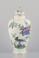 Meissen, 
Germany, large 
porcelain 
lidded jar 
hand-painted 
with exotic 
bird and floral 
...