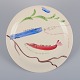 Stig Lindberg 
for 
Gustavsberg. 
"Löja" plate. 
Hand-painted 
with a fish 
motif. 
Satirical ...