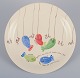Stig Lindberg 
for 
Gustavsberg. 
"Löja" plate. 
Hand-painted 
with a fish 
motif. 
Satirical ...