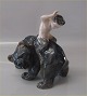 Royal 
Copenhagen 976 
Faun backwards 
on bear KK Knud 
Kyhn 1908 19 x 
17 cm Nice    
and in mint ...