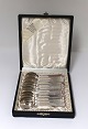 Georg Jensen. 
Silberbesteck 
(925). 
Pyramide. 12 
Mokkalöffel. 
Länge 9,5 cm. 
In einer Box.