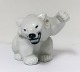 Königliches 
Kopenhagen. 
Eisbärjunges, 
sitzend. Modell 
233. Höhe 7,5 
cm. (1 Wahl)
