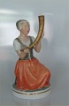 Royal 
Copenhagen 
Overglaze 12242 
RC Girl with 
the Golden horn 
Holger 
Christensen 1. 
and in mint ...