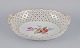 Meissen, 
Germany. 
Colossal open 
lace oval bowl. 
Hand-painted 
with polychrome 
flower motifs 
and ...