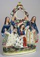 Staffordshire Uhrhälter 
mit drei 
Frauen. 
Polychromie, 
ca. 1830 - 
1840. Fayence. 
Guter Zustand. 
...