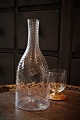 Swedish 1800s 
mouth-blown 
water carafe in 
twisted 
glass...