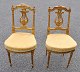 Ein Paar französische vergoldete Salonstühle, 19./20. Jahrhundert. Im Louis-XVI-Stil. Mit ...