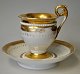 Deutsches 
Empire 
Porzellan-
Kaffeetasse mit 
Untertasse, 19. 
Jh. Weißes 
Porzellan mit 
Vergoldung. ...