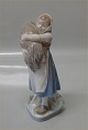 Royal 
Copenhagen 0908 
RC Girl wit 
corn sheaf Chr. 
Th 19 cm 1. 
sort og i hel 
stand Peasant 
girl ...