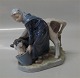 Royal 
Copenhagen 0779 
RC Girl with 
Calf  Chr. 
Thomsen 16 cm 
1. in mint 
condition